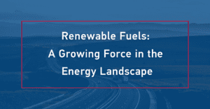 Highway scene with several vehicles driving through a rural landscape of open fields and low hills, overlaid with a red border and bold white text that reads “Renewable Fuels: A Growing Force in the Energy Landscape.”
